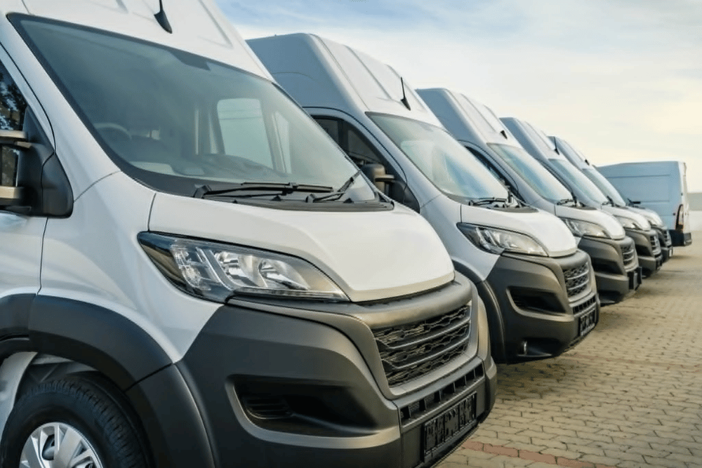 Fleet Maintenance Services in South Jordan, UT with Performance Place, Commercial delivery vans parking in a row, transporting and shipping service company